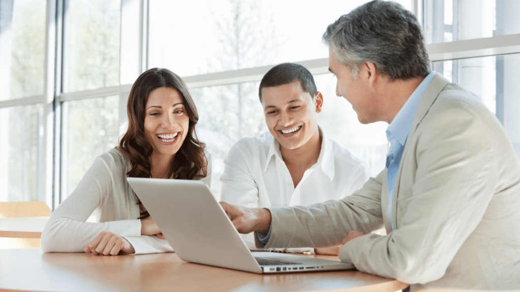 An image of a local London CPA and HR Consultant meeting with two small business owners to outline some business rules for their company.