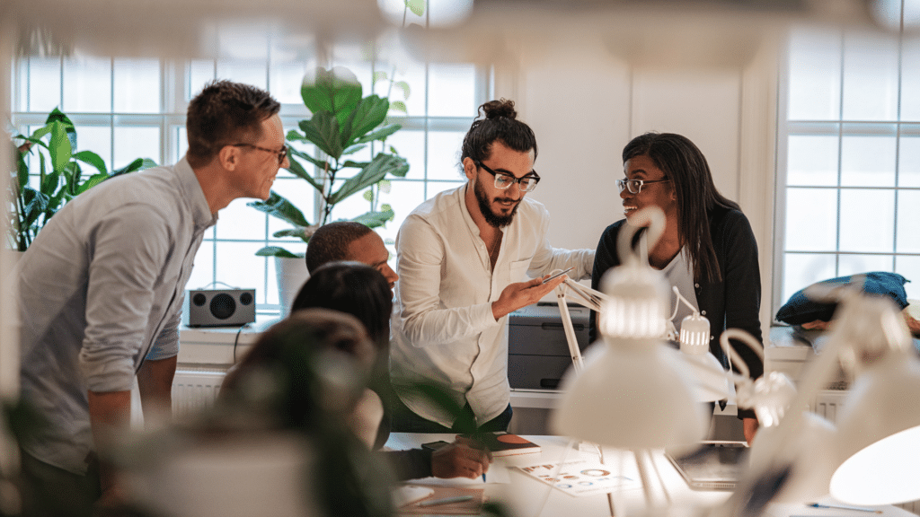 An image of some small business owners in London Ontario running a meeting at their startup.