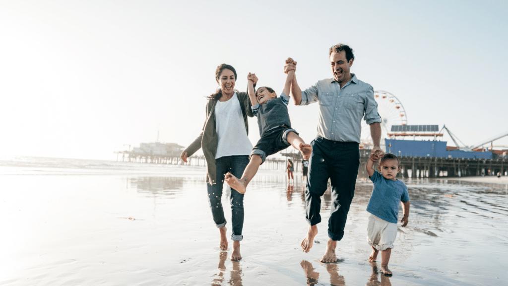 An image of a family enjoying a day at the beach on their statutory holiday.